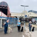 Puppy raisers Joe, Tina, Sue and Jacki with their puppies at the station