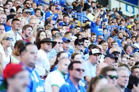 The Fratton End watches on for Bournemouth's visit to Fratton Park in 2016.