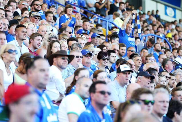 The Fratton End watches on for Bournemouth's visit to Fratton Park in 2016.