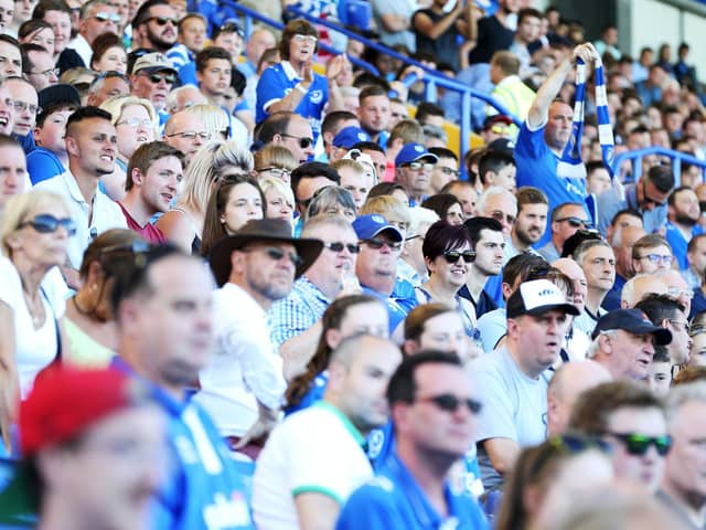 The Fratton End watches on for Bournemouth's visit to Fratton Park in 2016.