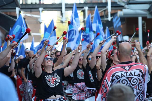Batala band members help create a carnival atmosphere