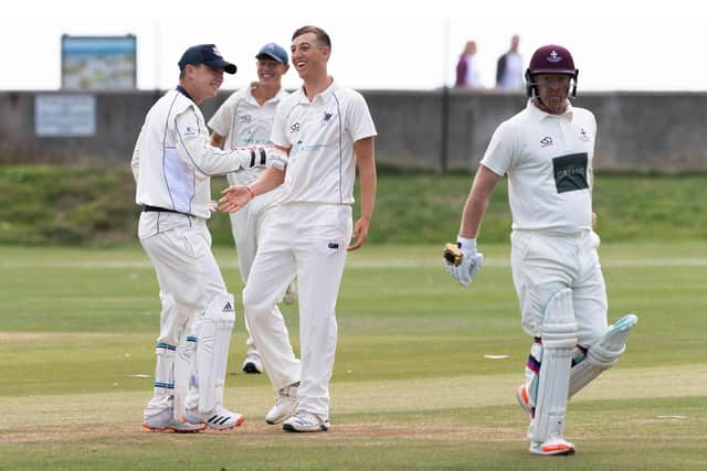 Joseph Kooner-Evans celebrates the wicket of former Hampshire player Jason Laney. Picture: Keith Woodland