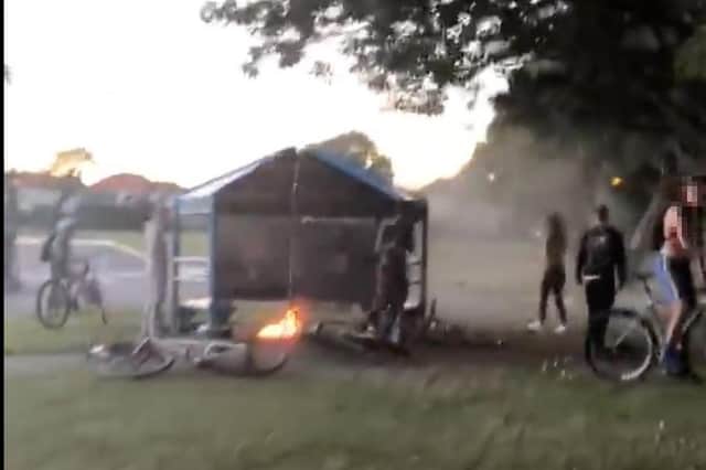A still from a video captured by Nelson ward Liberal Democrat councillor, Lee Hunt, who confronted youths and put out a fire with his shoes in Bransbury Park, Eastney, on Tuesday, August 18.