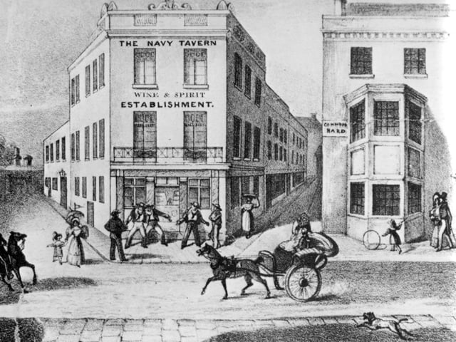 Half Moon Street between The Navy Tavern and the Common Hard sign.