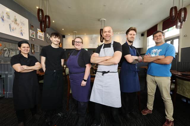 From left, Cosmina Popa, Valentine Knox-Johnston, Annie Martin-Smith, owner Kevin Bingham, Ollie Joell and Tomasz Wardecki at Restaurant 27, South Parade, Southsea
Picture: Chris Moorhouse (jpns 250821-26)