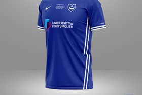 Again a more contemporary look to this design with a double white strip down the side - and a round neck like the Asics kit Pompey wore in the mid 90s.