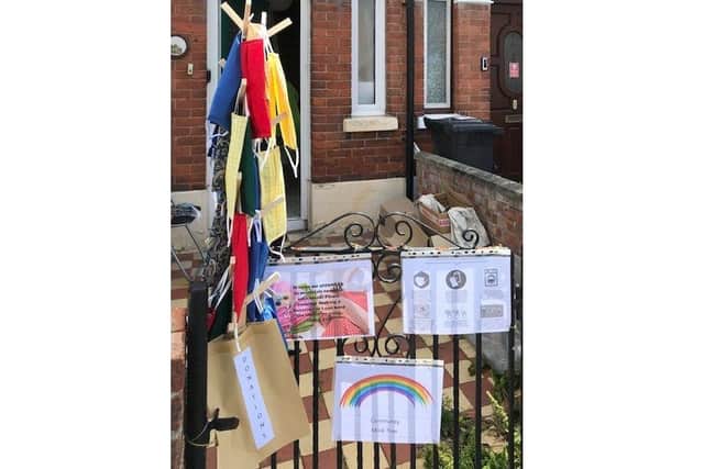 Community mask trees have been popping up around the country to offer free face coverings to passers by. Pictured: A tree set up by Fiona Loew from Southsea