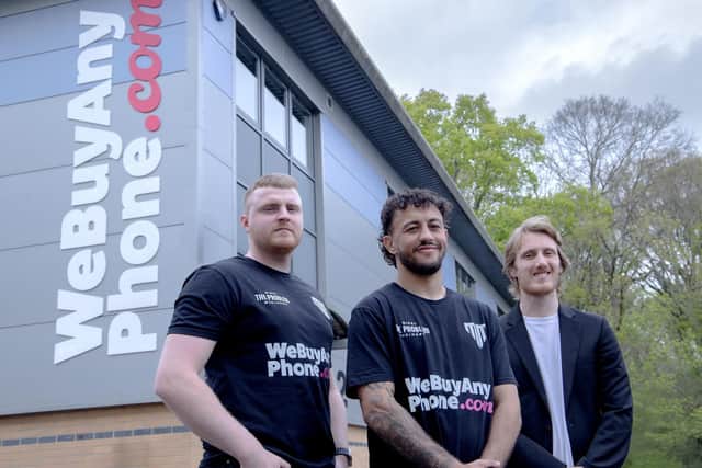 Pictured: (L-R) are: Mitchell Grant-Philips, Head of Operations at WeBuyAnyPhone.com; Michael McKinson; Charlie Nicholas, Head of Commercial at WeBuyAnyPhone.com