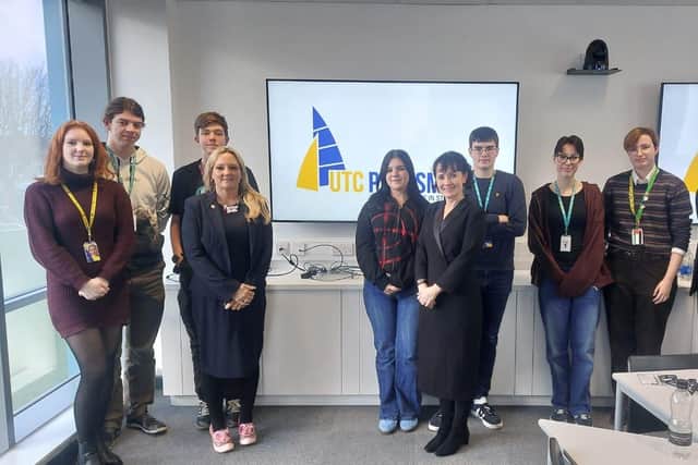 Portsmouth North MP Amanda Martin (front-right of the left hand group), Baker Dearing Chief Executive Kate Ambrosi (centre), UTC Portsmouth principal James Doherty (furthest right) and students.