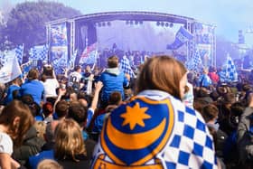 Pictured is: Pompey Supporters  celebrate with the players on the stage

Picture: Keith Woodland (280421-499)