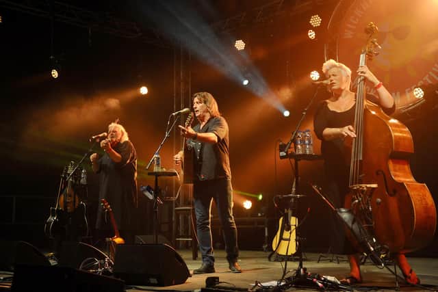 Miranda Sykes in action with Show of Hands at the 2018 Wickham Festival. Picture: Sarah Standing
