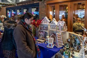 Traditional gingerbread houses on sale at Port Solent. Picture: Mike Cooter (091223)