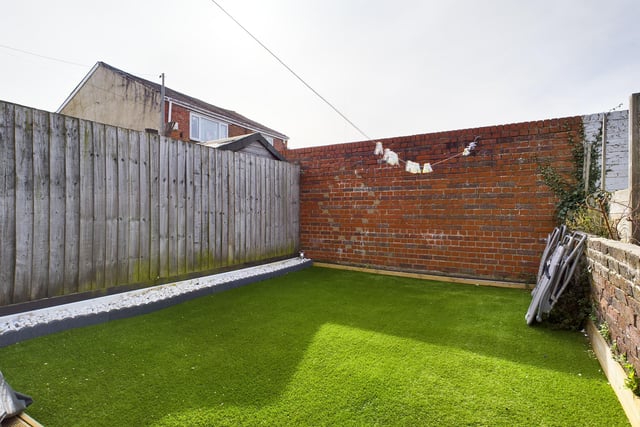 The garden is west facing, and comes with artificial grass.