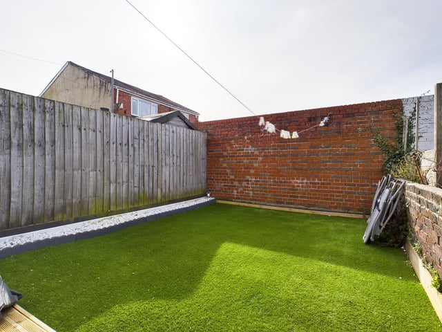 The garden is west facing, and comes with artificial grass.