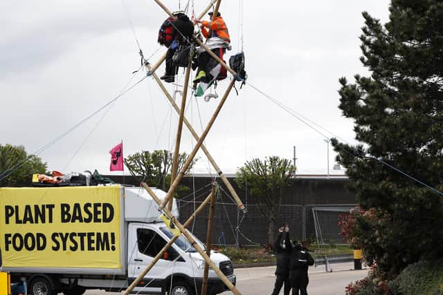 Animal Rebellion said about 50 activists were using trucks and bamboo structures to stop lorries leaving depots in Hemel Hempstead, Basingstoke, Coventry and Heywood, Greater Manchester.  Photo by Darren Staples/Getty Images