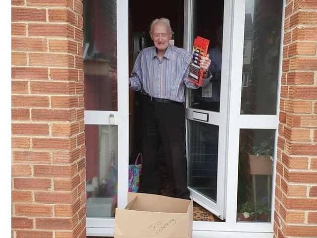 Gosport Voluntary Action has been supporting the community through its Close Encounters project. Pictured: Mr M, a pleased recipient of an activity pack to help with his painting