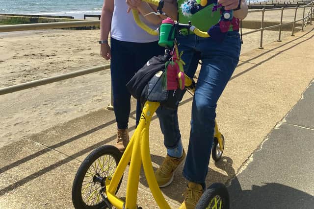 Harley with Eve Payler, Specialist Huntington's Disease advisor for Hampshire, Berkshire and IOW who accompanied Harley on his final challenge, a 5K walk.
