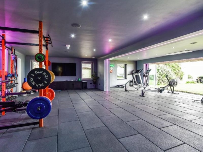 This property comes with six bedrooms, four bathrooms and five reception rooms. 

This home also comes with a heated pool, a gym and a large decked area. 

This home is on the market for offers over £3,000,000. 
This house is on the market with Jeffries & Dibbens Estate Agents. 

The listing says: "Comprising of approximately 7160 square feet, this impressive family home is situated on Hill Head Seafront and boasts panoramic views across the Solent to the Isle of Wight." 

The listing says: "The current owners have extensively renovated and extended the property, adding a heated swimming pool with deck, a fully equipped, sea-facing gym and a sleek office with vaulted ceilings."

This property is near public transport links including Fareham train station and Gosport Ferry Terminal. 
There are also local schools close by including Crofton Hammond Junior School and Crofton Hammond Infant School.