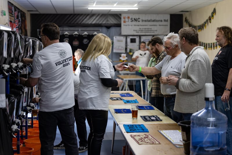 The busy serving area at the Wickham Beer Festival. Picture: Mike Cooter (060424)