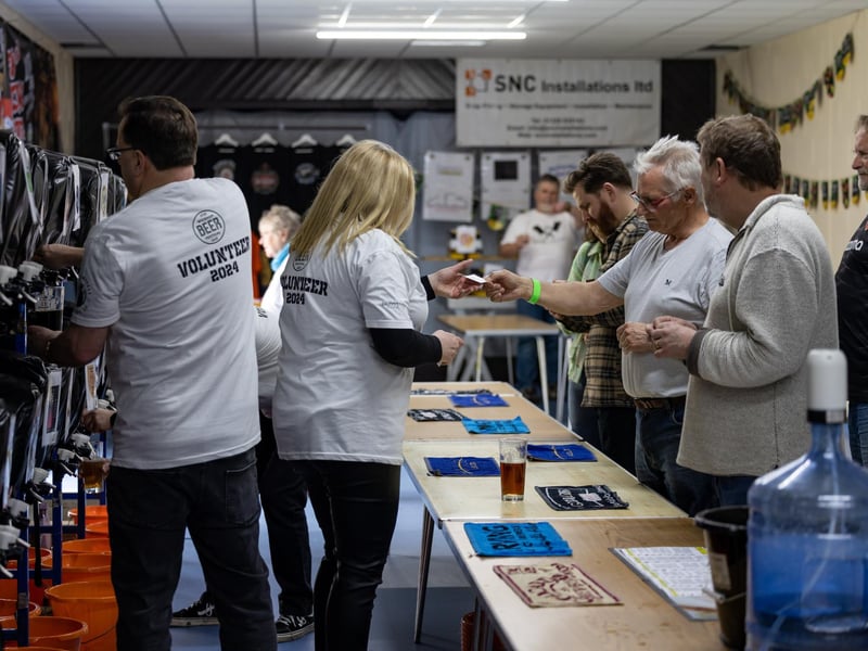The busy serving area at the Wickham Beer Festival. Picture: Mike Cooter (060424)