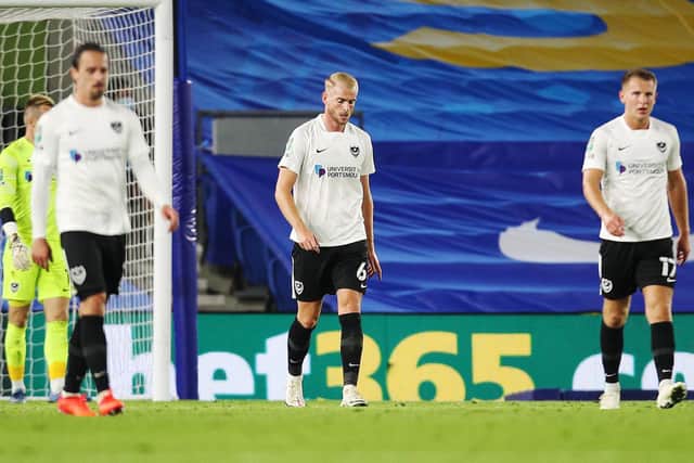 Pompey dejected after conceding against Brighton. Picture: Joe Pepler