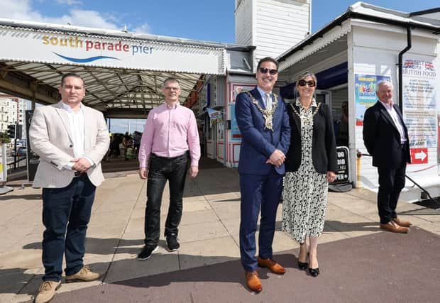 From left, App designers Paul Cramp and Anthony Clarke, Lord Mayor of Portsmouth Cllr Rob Wood, Lady Mayoress Debra Wood and CEO Shaping Portsmouth Stef Nienaltowski. Picture: Chris Moorhouse (310820-09)