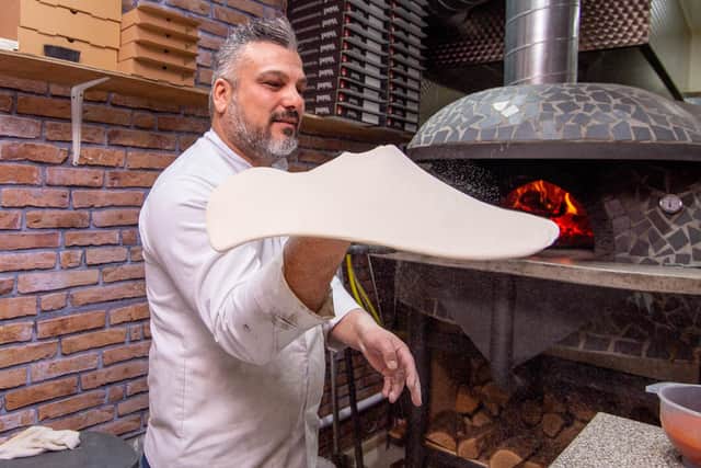 Chef Badal Mohammed preparing the Portsmouth Special pizza
Picture: Habibur Rahman