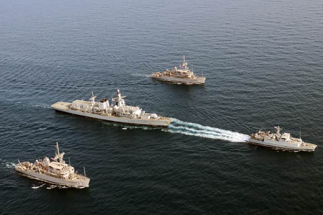 HMS Shoreham leads frigate HMS Argyll, flanked by American minehunters USS Dextrous (nearest the camera) and USS Gladiator