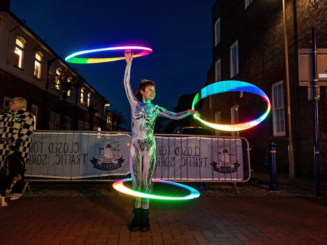 Street entertainer Sol (from Daze Entertainment) shows off her dazzling hula-hoop skills. Picture: Mike Cooter (251123)