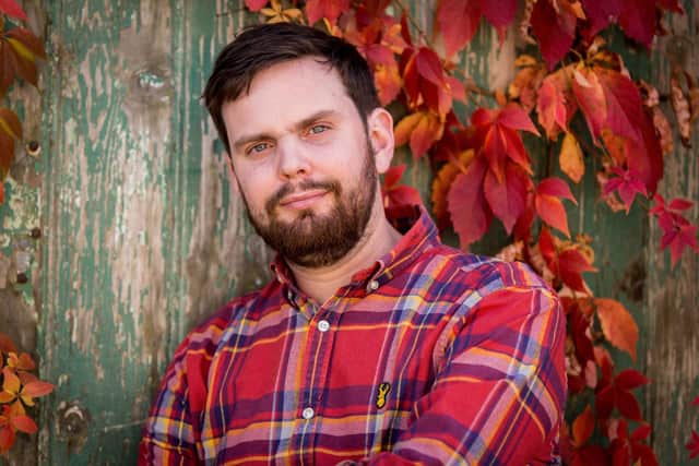 Olly Clarke, owner of Paws and Claws Photography Picture: Ash Black Photography