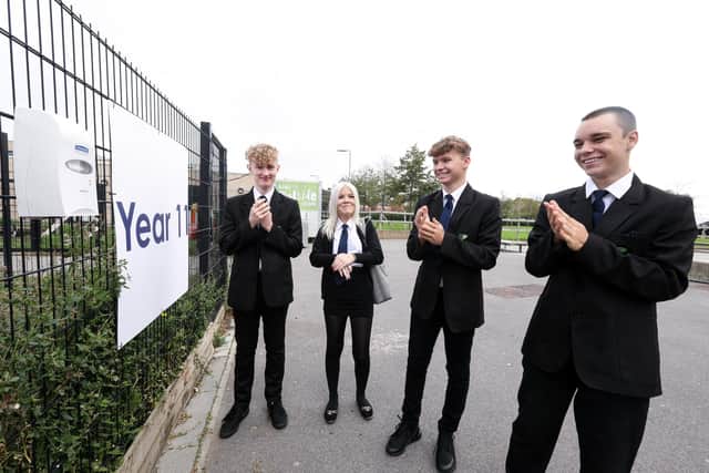 Year 11 Park Community School pupils, Max Wallis, 15, Mollie-Mai Clark, 15, Taylor Anderson, 16, and Daniel Haines, 15 using hand sanitiser.
Picture: Chris Moorhouse