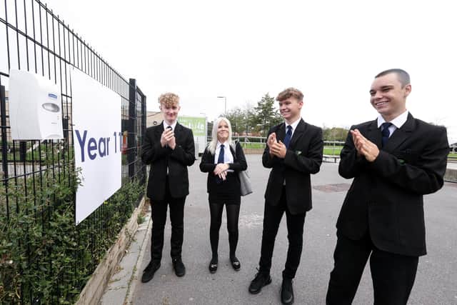 Year 11 Park Community School pupils,  Max Wallis, 15, Mollie-Mai Clark, 15, Taylor Anderson, 16, and Daniel Haines, 15 using hand sanitiser. 

Picture: Chris Moorhouse