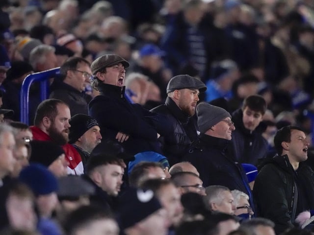 These fans keep the atmoshphere going at Fratton Park.