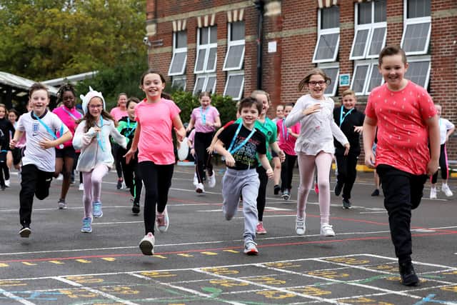 Kids from Newbridge and Penhale Infants School in Portsmouth pictured taking part in a mini Race for Life.Picture: Sam Stephenson