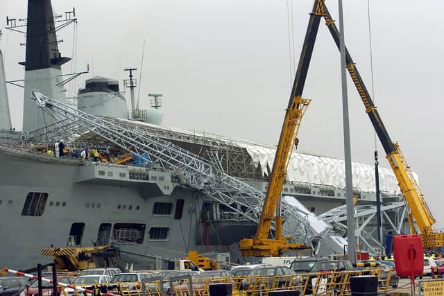 Two mobile cranes were brought in to help lift the fallen crane. Picture Paul Jacobs (045488-3)