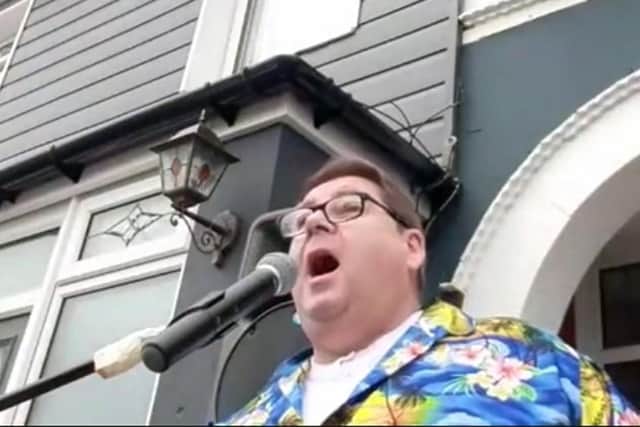 Part-time entertainer Andy George who performed a gig in his driveway to raise cash for the NHS and QA. 

Picture: Andy George