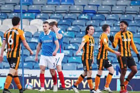 Hull celebrate their third goal at Pompey. Picture: Joe Pepler