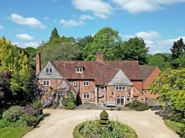 This Grade II listed property comes with five bedrooms, three bathrooms and three reception rooms and it has a warm village feel.