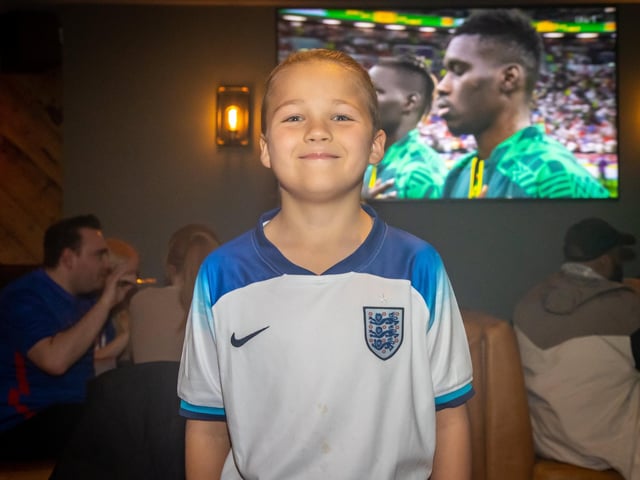 Pictured - Young England fan Ryder Miller, 10, before the match started. Photos by Alex Shute.