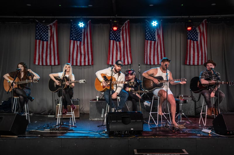Lianne Kaye, Chloe Leigh, Nick Edwards, Jimmy Stanley and Thomas Kavanagh performing at Country on the Coast 2024.