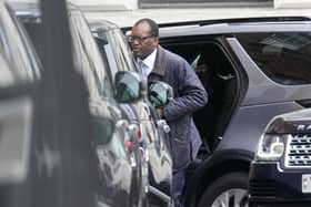 Chancellor of the Exchequer Kwasi Kwarteng arriving in Downing Street, London, after returning from the US ahead of schedule for urgent talks with Prime Minister Liz Truss as expectations grow that they will scrap parts of their mini-budget to reassure markets. Picture: Stefan Rousseau/PA Wire.