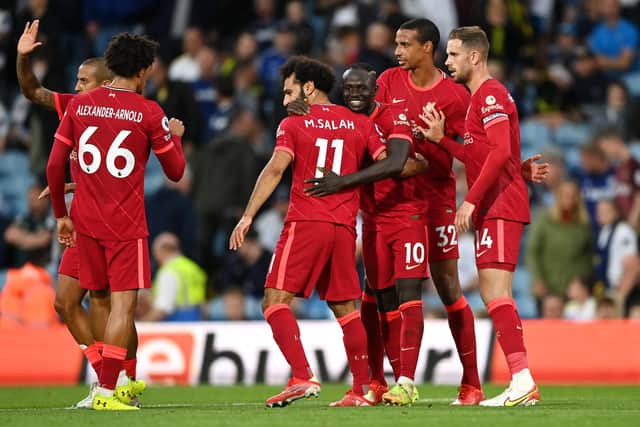 Mo Salah celebrates his 100th Premier League with his Liverpool team-mates at Leeds' Elland Road Picture: Shaun Botterill/Getty Images
