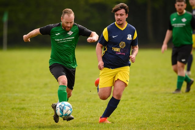 Action from Saturn Royale's 1-0 win over Pelham Arms (blue and yellow kit) in the second Adelaide Cup semi-final. Picture: Keith Woodland (300421-839)