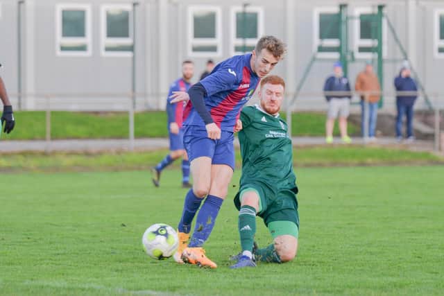 James Franklyn battles for possession against Brockenhurst. Pic: Martyn White.