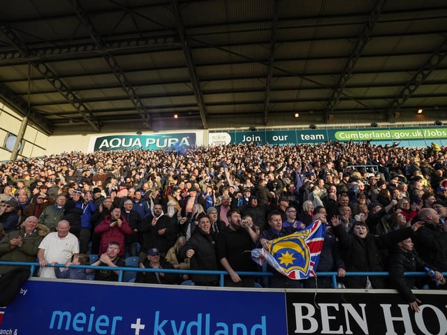It's a 14-hour round trip between Portsmouth and Carlisle - but these fans don't care!