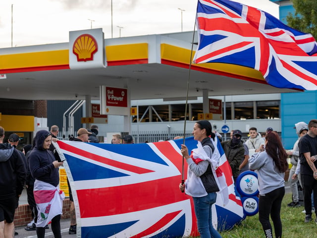 Anti-immigration protest formed near the UK Border Agency Building in Portsmouth. Picture: Mike Cooter (070824)