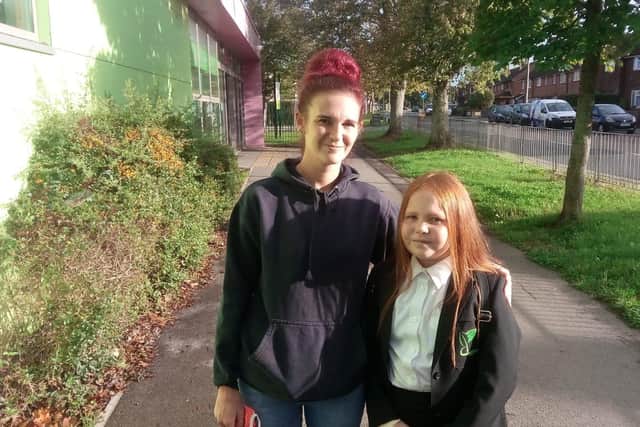 Charla Nixon with daughter Kadie Nixon, 11. Charla feels returning to school will provide 'a bit of normality' for children.
