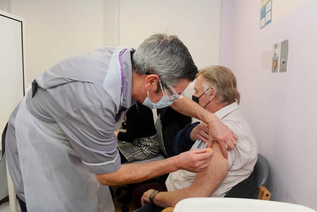 David Senior from Cosham having his vaccination at St James' Hospital last month
Picture: Sarah Standing (010221-1959)
