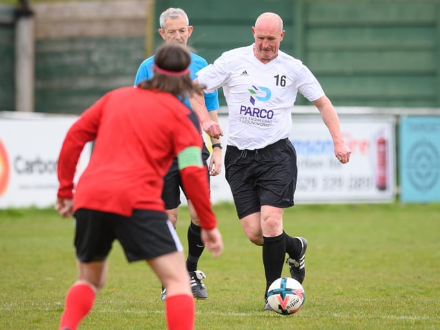 Action from the Jon Gittens memorial charity match between a team of former Fareham Town players and a side of ex-Pompey and Southampton professionals. Picture: Keith Woodland (160421-426)
