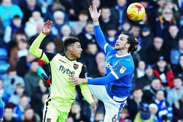 Ollie Watkins in action for Exeter against Christian Burgess at Fratton Park in January 2017. Picture: Joe Pepler/Digital South.